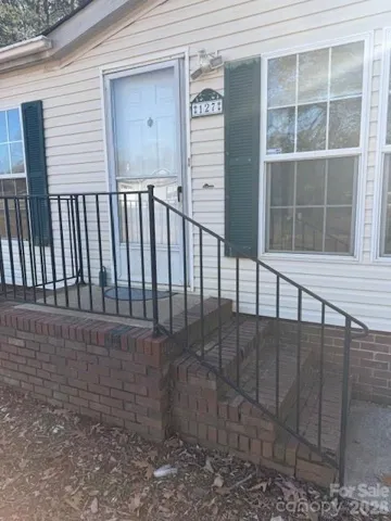 Front  Entrance w/ rod iron safety railing