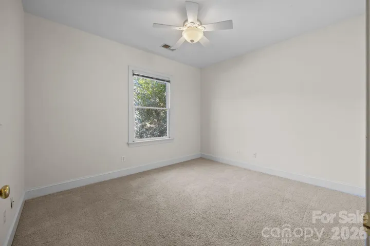 The secondary bedrooms are generously spacious, ensuring comfort and versatility for family members or guests. 