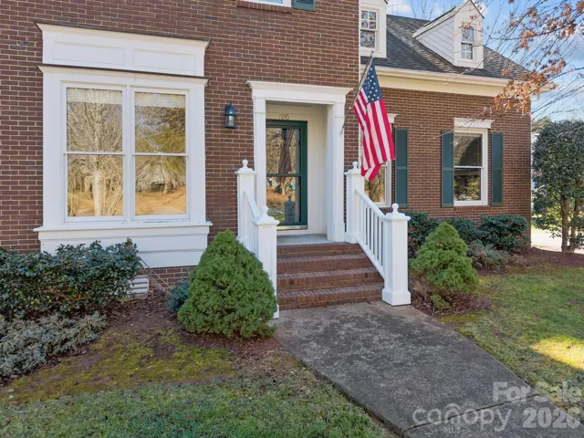 The front stoop, often used interchangeably with a small front porch, is an architectural feature at the entrance of the home, with a few steps leading to the landing of the front door.