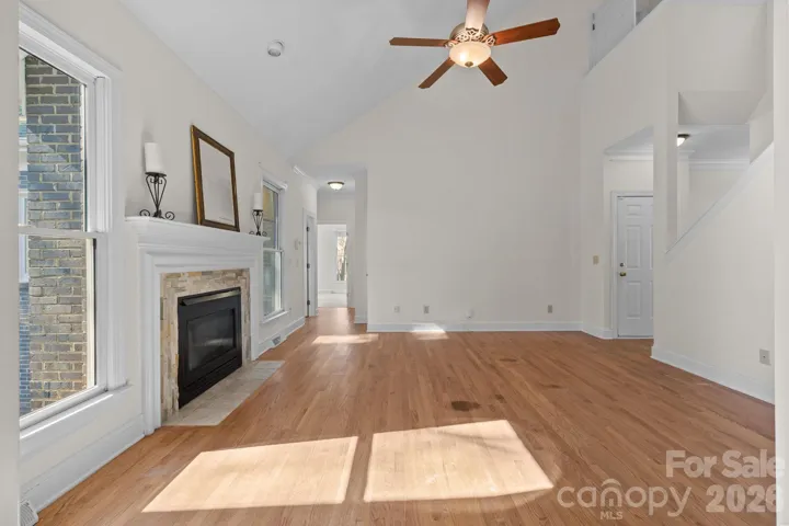 This room serves as the heart of the home, a truly spacious family great room designed for both comfort and connection. 