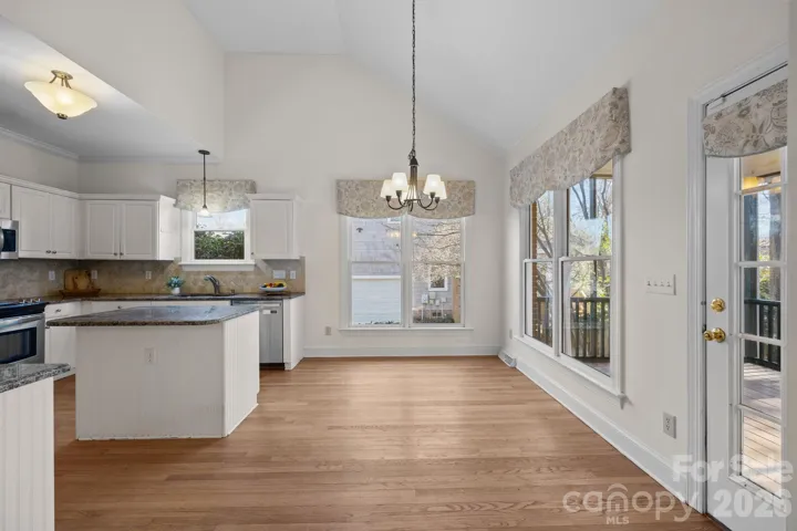 Natural light pours into the space through lots of windows, ensuring a bright, cheerful, and inviting atmosphere throughout the day.