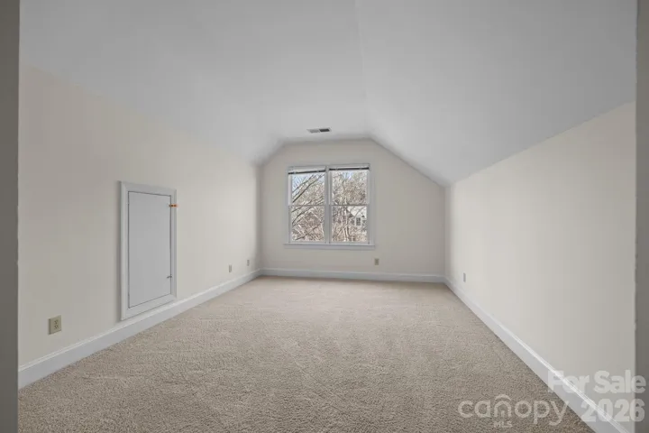 This versatile room is listed as a fourth bedroom, but its size, location, and potential make it an ideal bonus room to suit the homeowner's needs.