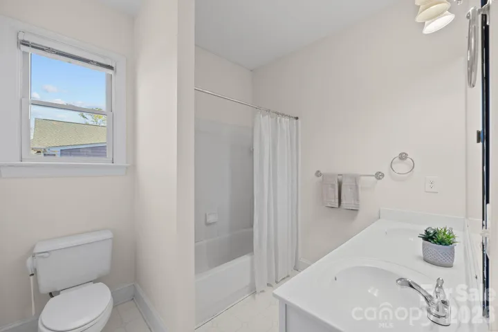 The second-story bath is designed for the comfort and convenience of the bedrooms on the upper floor. 