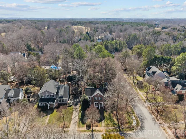 This is a truly exceptional property that combines a traditional, low-maintenance brick exterior with both privacy and prime location.