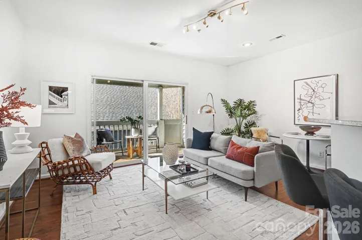 Bright Living Room that Opens to a Private Balcony—Perfect for Morning Coffee or Evening Views.