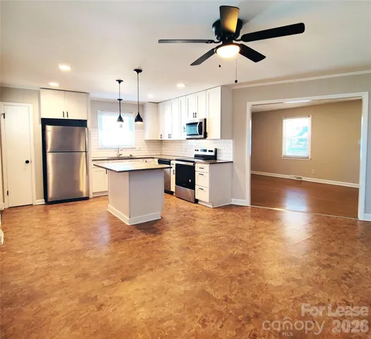 Large dining area sits next to kitchen!