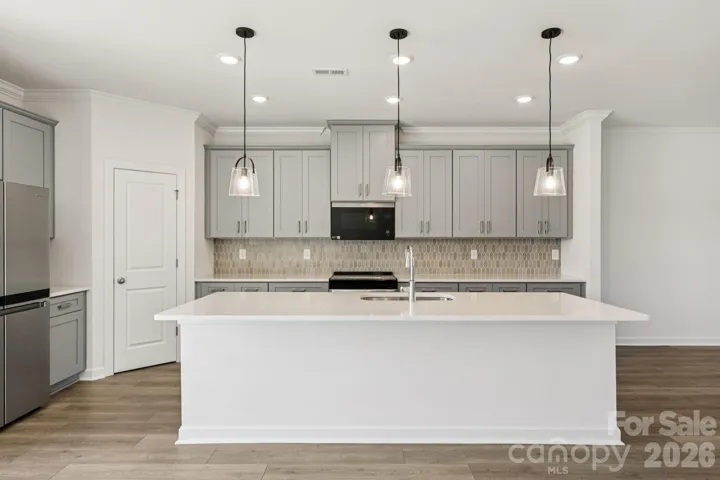 Photo is not of the actual home, but is an inspirational photo of builder’s model home and may depict options, furnishings, and/or decorator features that are not included