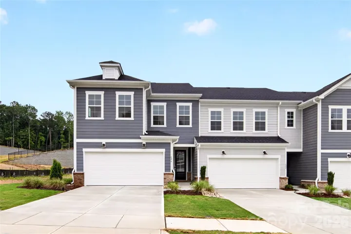 Low maintenance townhome living in Cramerton, NC with 2 bay garage and full length driveway