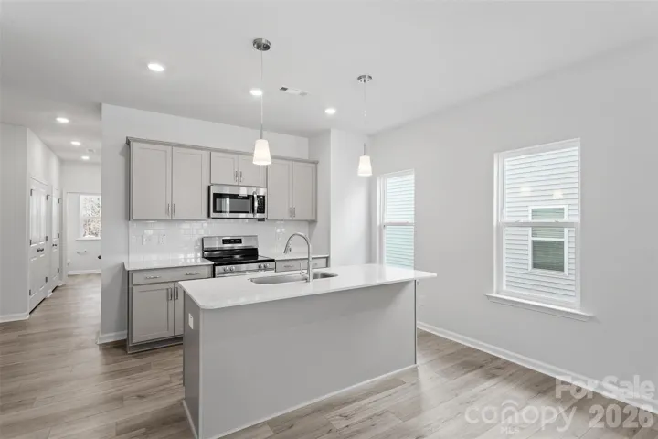 Unit 3 features a Cannalily B floorplan. Please note that the following photos are stock photos only and the actual home selections may vary.