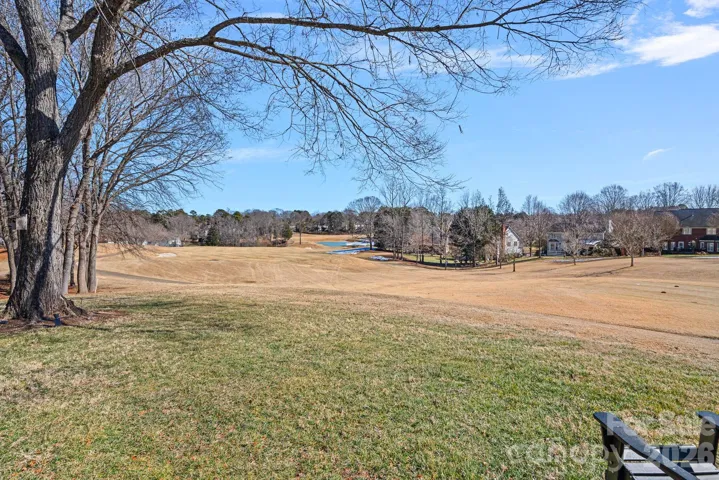 Golf Course view from backyard grassy area.