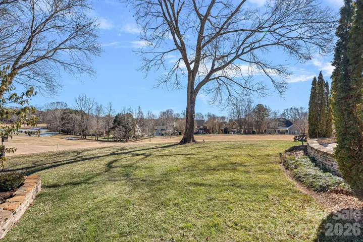 Backyard grassy area overlooking Golf Course.