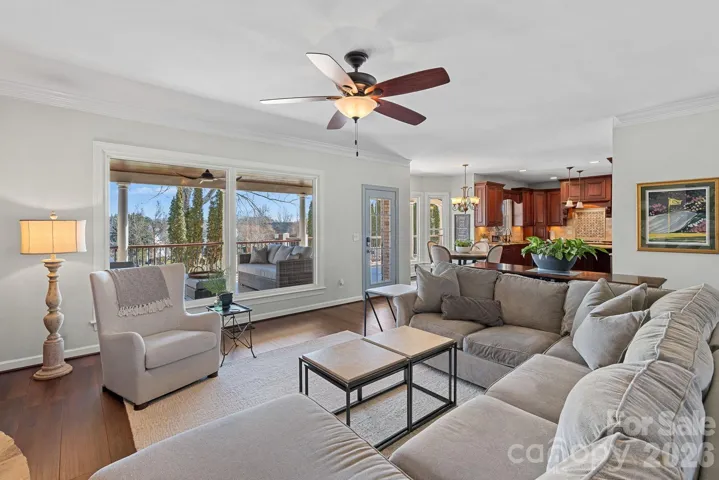 Open concept floor plan makes entertaining from the Great Room to the Kitchen to the outside covered porch living space a breeze.