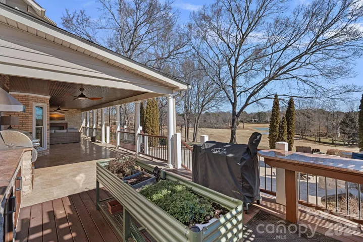 View from the uncovered portion of the outdoor living space onto the Golf Course view.