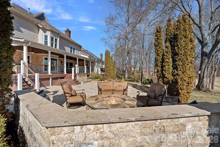 Another view of the outdoor firepit area