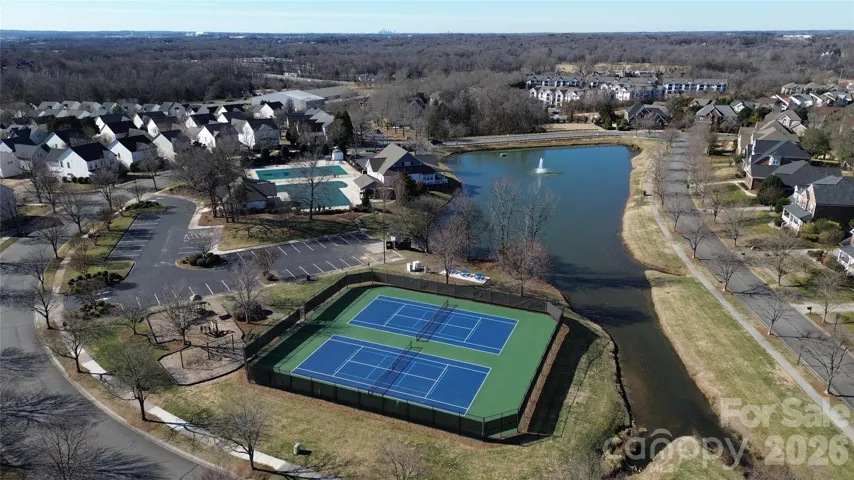 Community center with pool, play ground, tennis courts and more