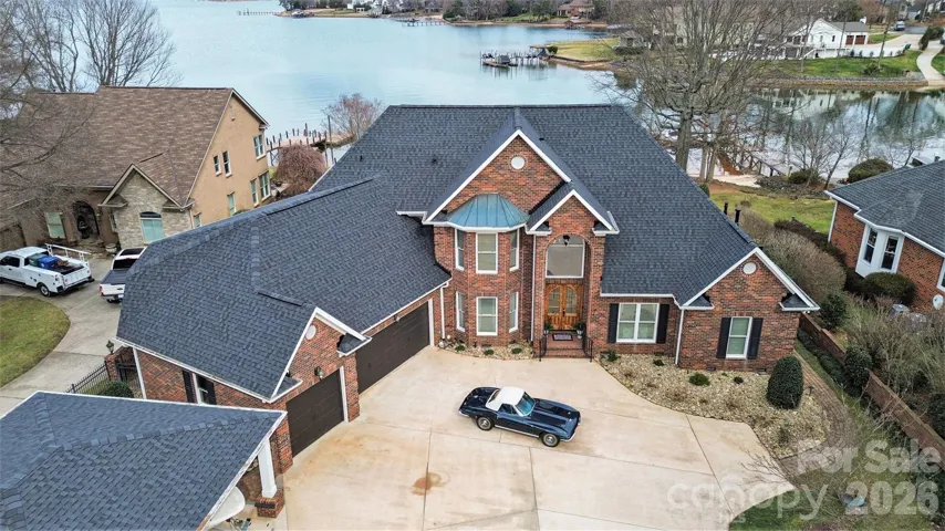 This stunning luxury waterfront residence blends timeless architecture with modern updates throughout.