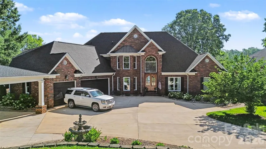 This waterfront luxury home defines refined lake living.