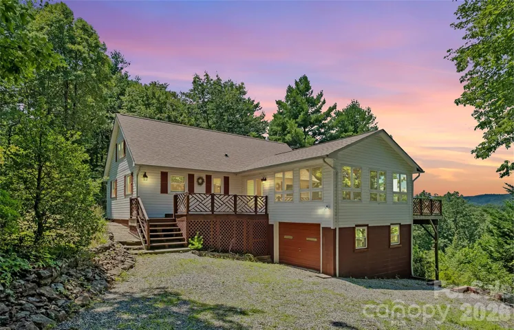 Front exterior at dusk. *Photo has been virtually enhanced.*