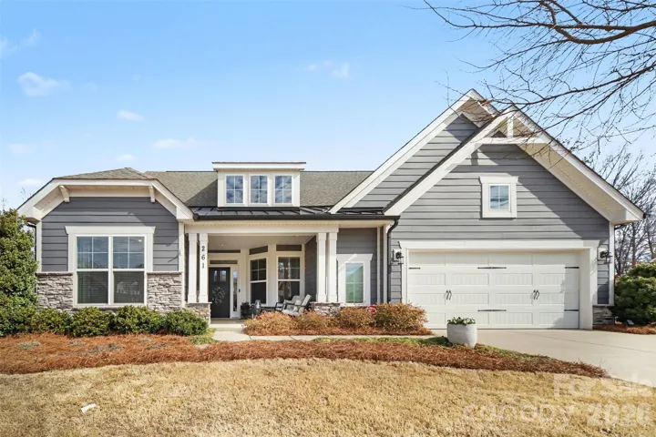 Welcome to 261 Bouchard Drive in Waxhaw, NC- This beautiful home offers the perfect blend of convenience and privacy on a large exterior lot over looking many acres of HOA owned land