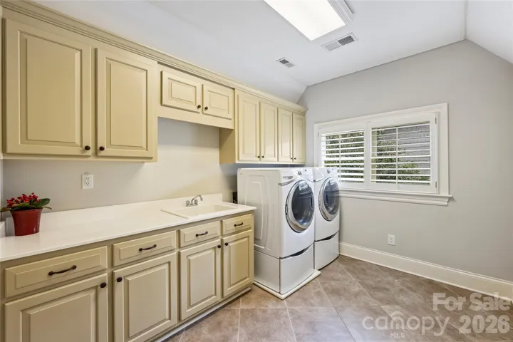 Large laundry room with sink 