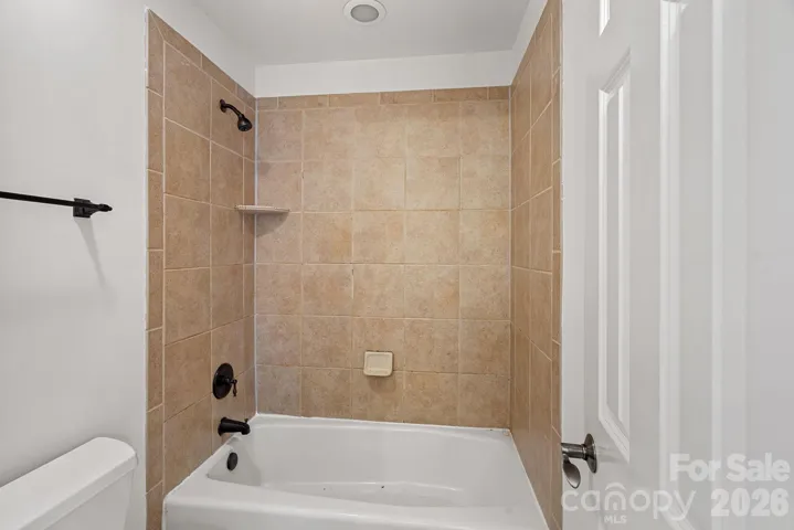 Virtually staged as a bonus room OR could be Bedroom #5 (no closet) 