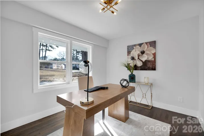 Home Office / Flex Room – Versatile space perfect for a home office, study, or creative studio, complete with abundant natural light.