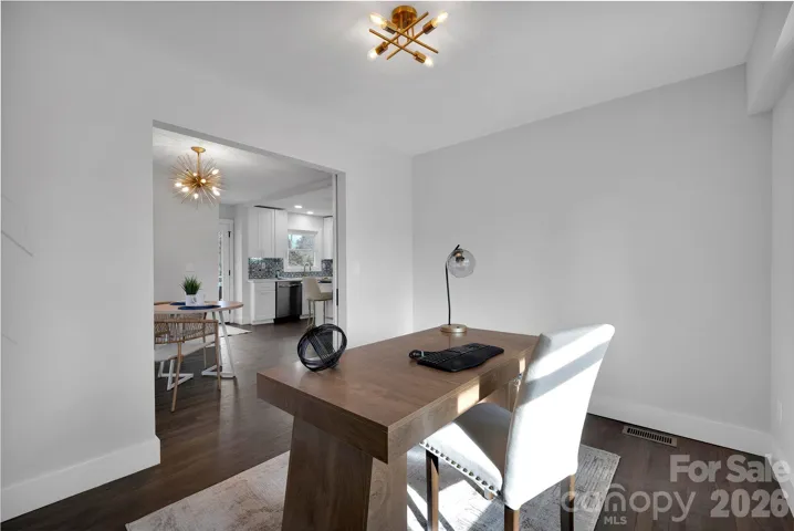 Home Office (Alternate View) – Flexible room positioned just off the main living area, offering convenient access while maintaining a sense of separation.