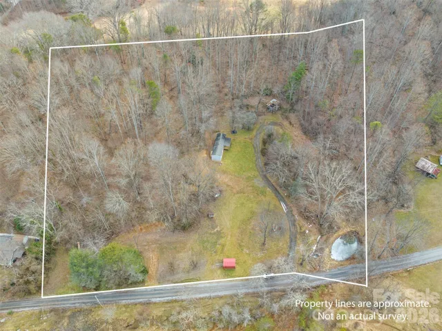 6+/- acres with 2 vacant house sites with septic tank installed