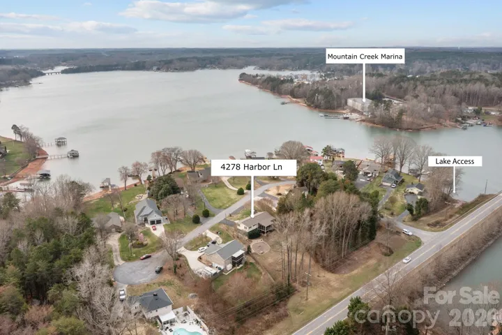 Aerial iew of the home, lake access and mountain creek marina. Beautiful water views!
