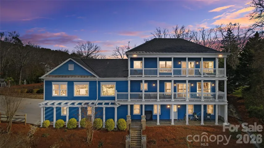 Expansive porches invite you to sip sweet tea at sunset, while grand interiors—complete with designer finishes and walls of windows—create the perfect setting for both intimate evenings and unforgettable gatherings
