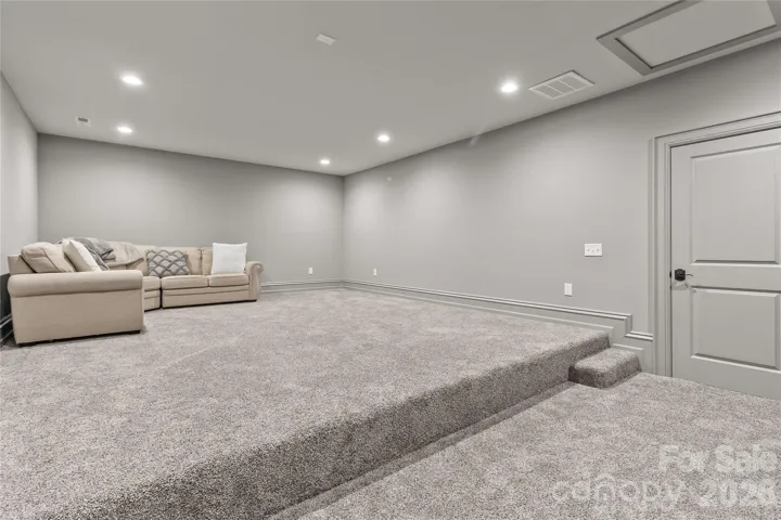 Pre-wired theater room and pre-plumbed for a wet bar