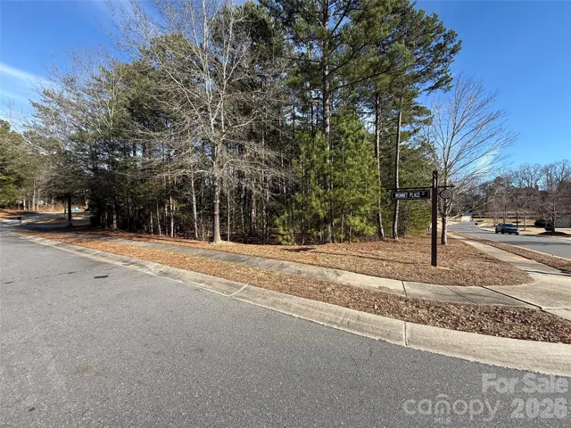 Corner lot offers extensive frontage, ideal for a wide custom home design.