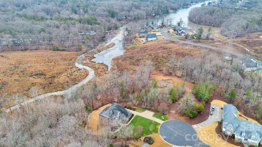1.5-acre private setting—rare in this price range with access to Lake Wylie