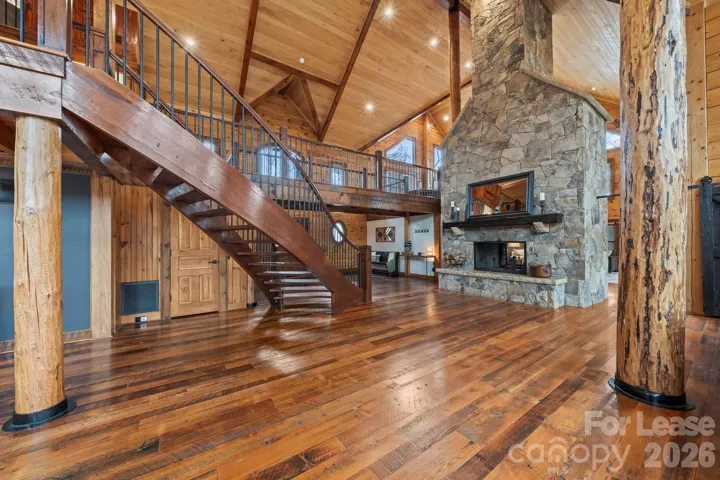 Stone see-though wood-burning fireplace