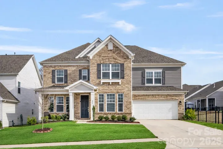 Front lawn digitally enhanced with green grass