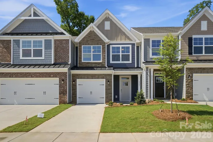Homesite 211 features an Ashland L floorplan