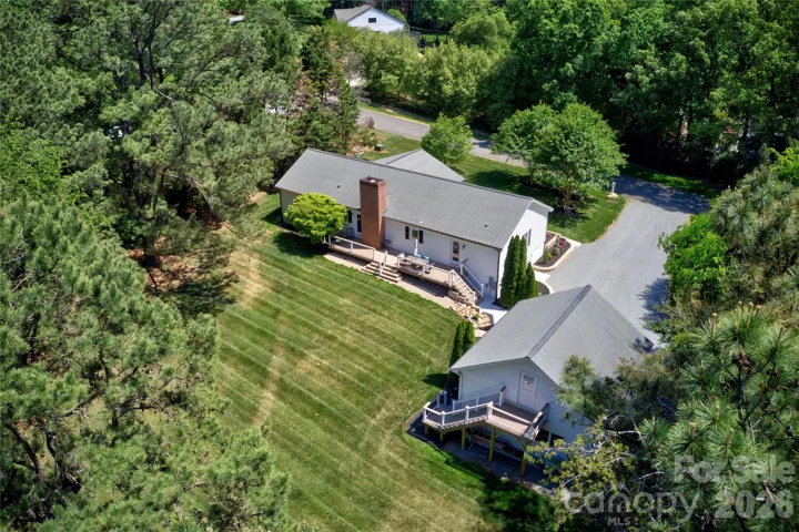 1+acre homesite w/updated ranch and detached 2-story garage