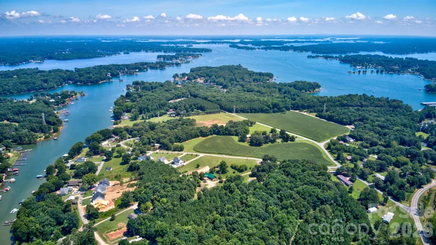 Experience the ultimate lake lifestyle with this impeccably located home, offering direct access to the water and all the wonderful activities that come with it.