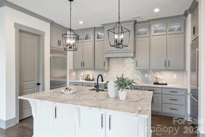 Gourmet Kitchen with oversized Island and 2 Thermador refrigerators