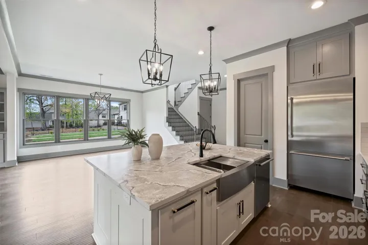 Kitchen View to Dining area. Pantry and Refrigerator #1