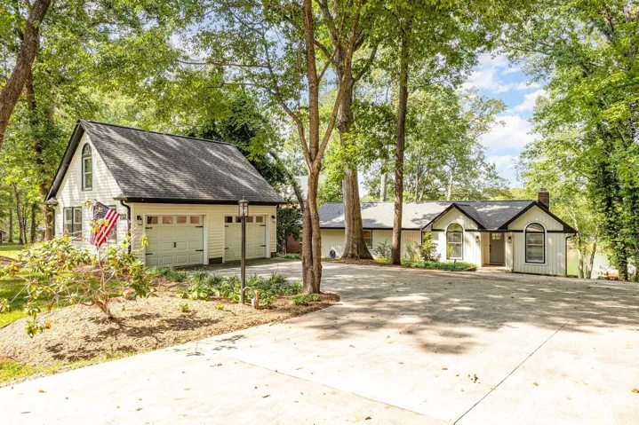 Single Story ranch home with walk out lower level on Lake Norman! 2 car detached garage.