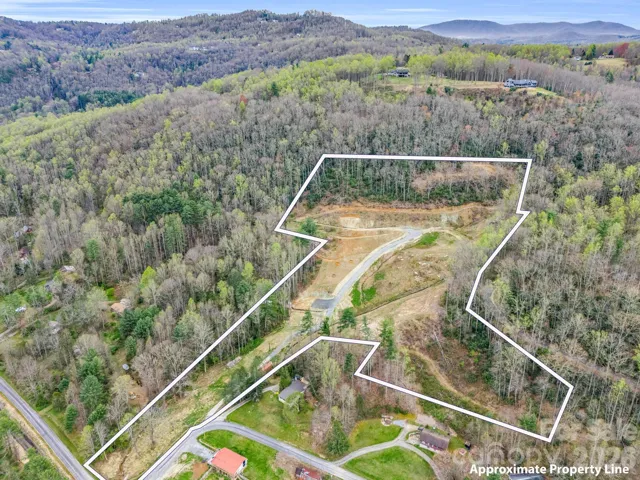 Aerial of approximate lot lines, mostly cleared and ready for building