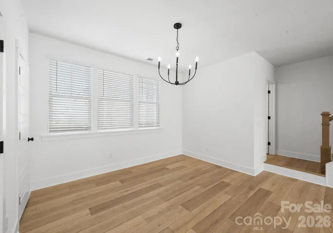 Photo is of lot 1 in community, finishes may vary