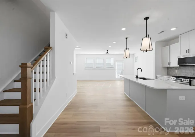 Photo is of lot 1 in community, finishes may vary