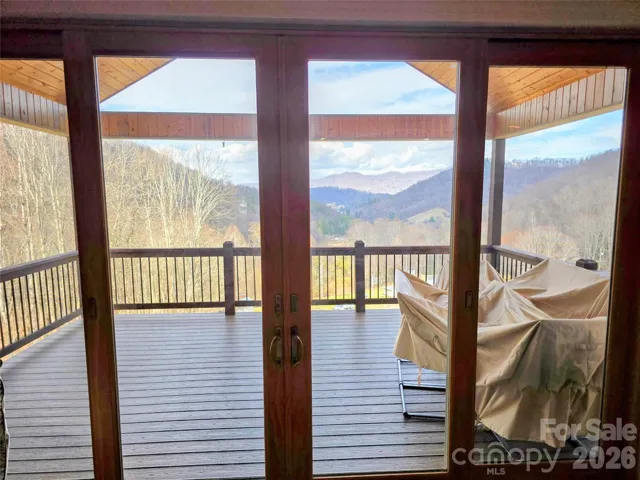 Looking at front porch/deck from great room