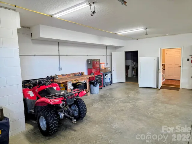 Garage area with small shop area