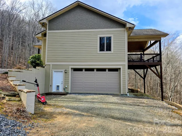 Looking at north end of the house with garage door
