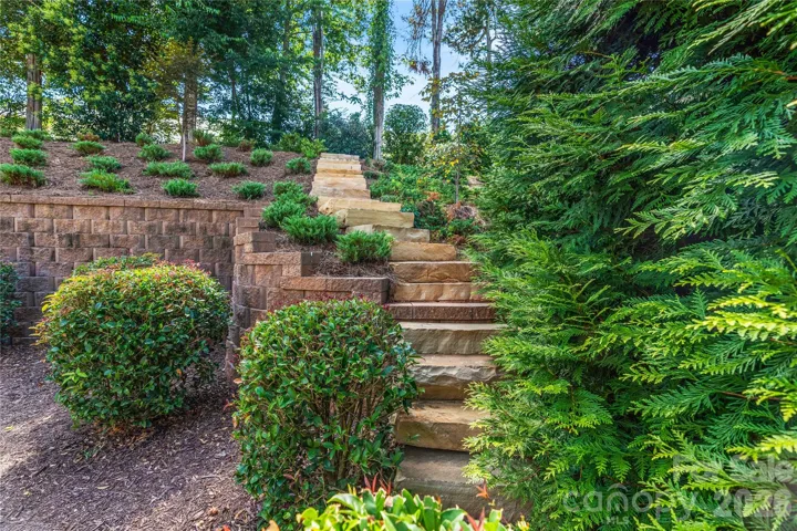 Completely Private Back Yard with Paver Patio, Gas Fire Pit, & Outdoor Kitchen!