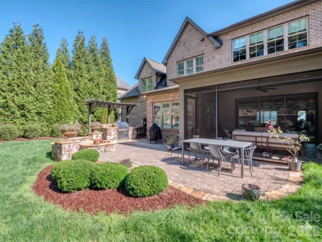 Completely Private Back Yard with Paver Patio, Gas Fire Pit, & Outdoor Kitchen!