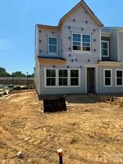Homesite 7 features an end-unit Cannalily plan (under construction)